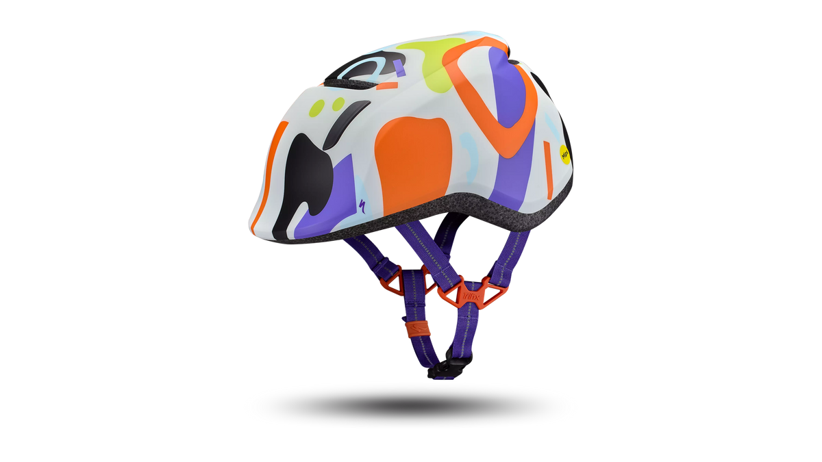 Kids bike helmet with multicolor abstract graphic and adjustable chin strap