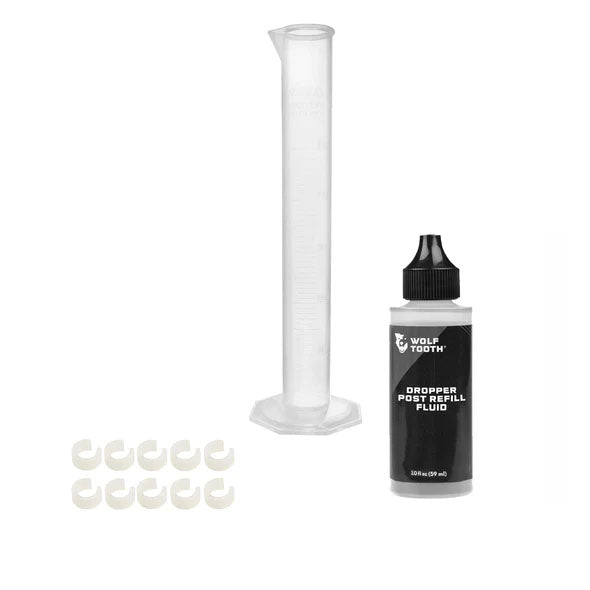 Resolve Dropper Post Service Kit - Refill Fluid 2oz Graduated Cylinder 10 Travel Adjustment Spacers - Bicycle Warehouse