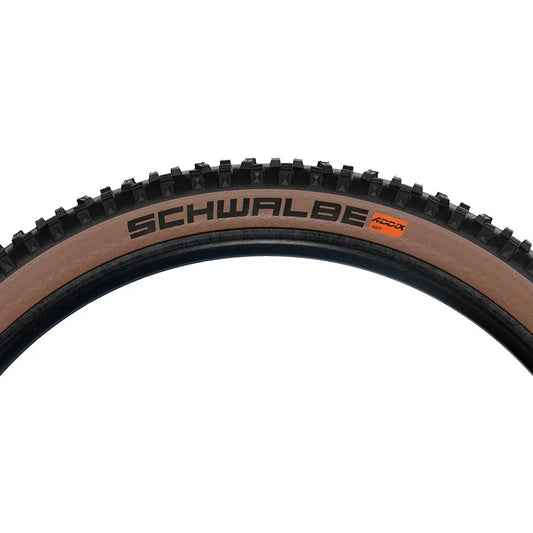Hans Dampf Tire - 29 x 2.35 Tubeless Folding BLK/Bronze Evolution Line Super Trail Addix Soft - Bicycle Warehouse