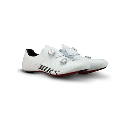 White cycling road shoe with two-buckle closure and red outsole trim