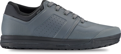 The Specialized 2FO DH Flat Mountain Bike Shoe in gray features a black sole for superior pedal grip, a perforated side panel, and a black ankle collar, shown in side profile on a white background.
