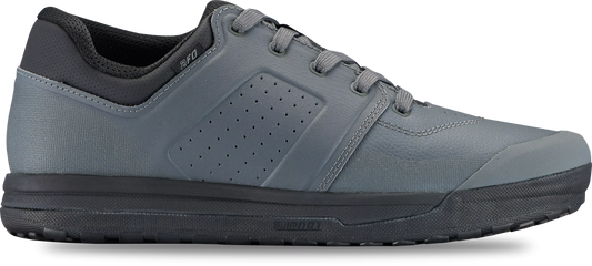 The Specialized 2FO DH Flat Mountain Bike Shoe in gray features a black sole for superior pedal grip, a perforated side panel, and a black ankle collar, shown in side profile on a white background.