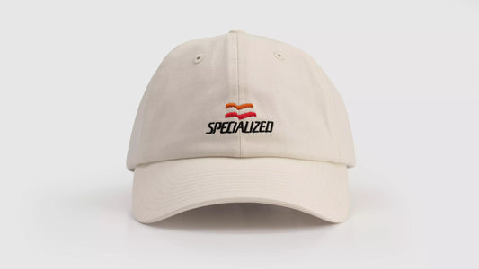 Beige 6-panel dad hat with Specialized logo and flag graphic front