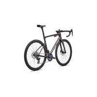 Road bike with dark gray frame, drop handlebars, and front wheel