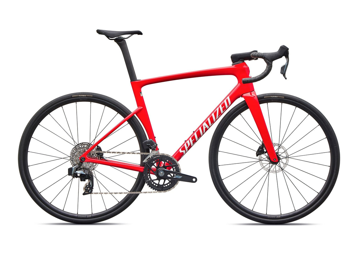 Vivid red road bike with drop handlebars, aero frame, and disc brakes