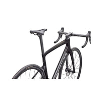 Charcoal road bike close-up of fork, handlebars, and integrated frame styling