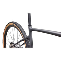 Gravel bike frame and front wheel, dark metallic with tan rim stripe