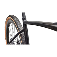 S-Works road e-bike, close-up of front wheel and tread tire with orange rim edge