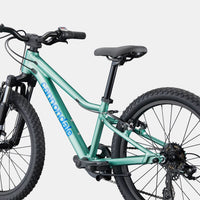 Kids trail bicycle teal frame with front suspension, black seat and knobby tires
