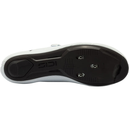 White cycling shoe outsole with cleat mounting holes, black tread underside view
