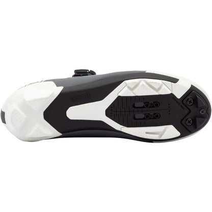 Women’s clipless cycling shoe outsole view, white sole with black traction tread