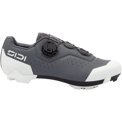 Women’s dark gray clipless cycling shoe with white accents and black buckle closures