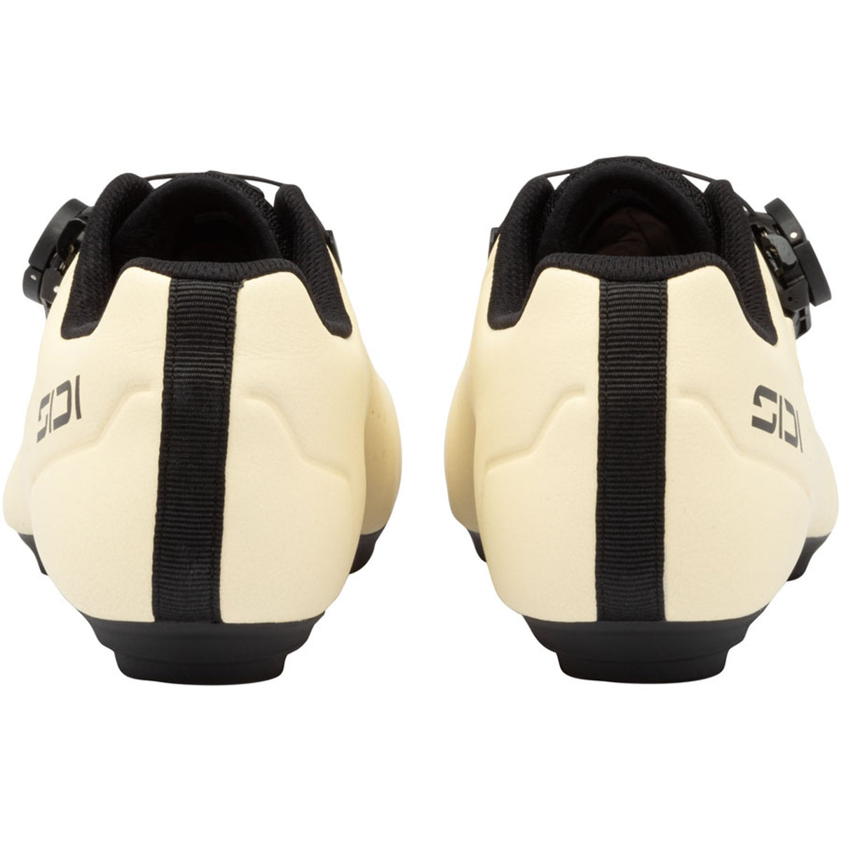 Pair of cream road cycling shoes with black heel strap and rear cutouts