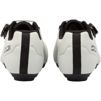 Light grey cycling shoes with black elastic heel straps and SIDI branding