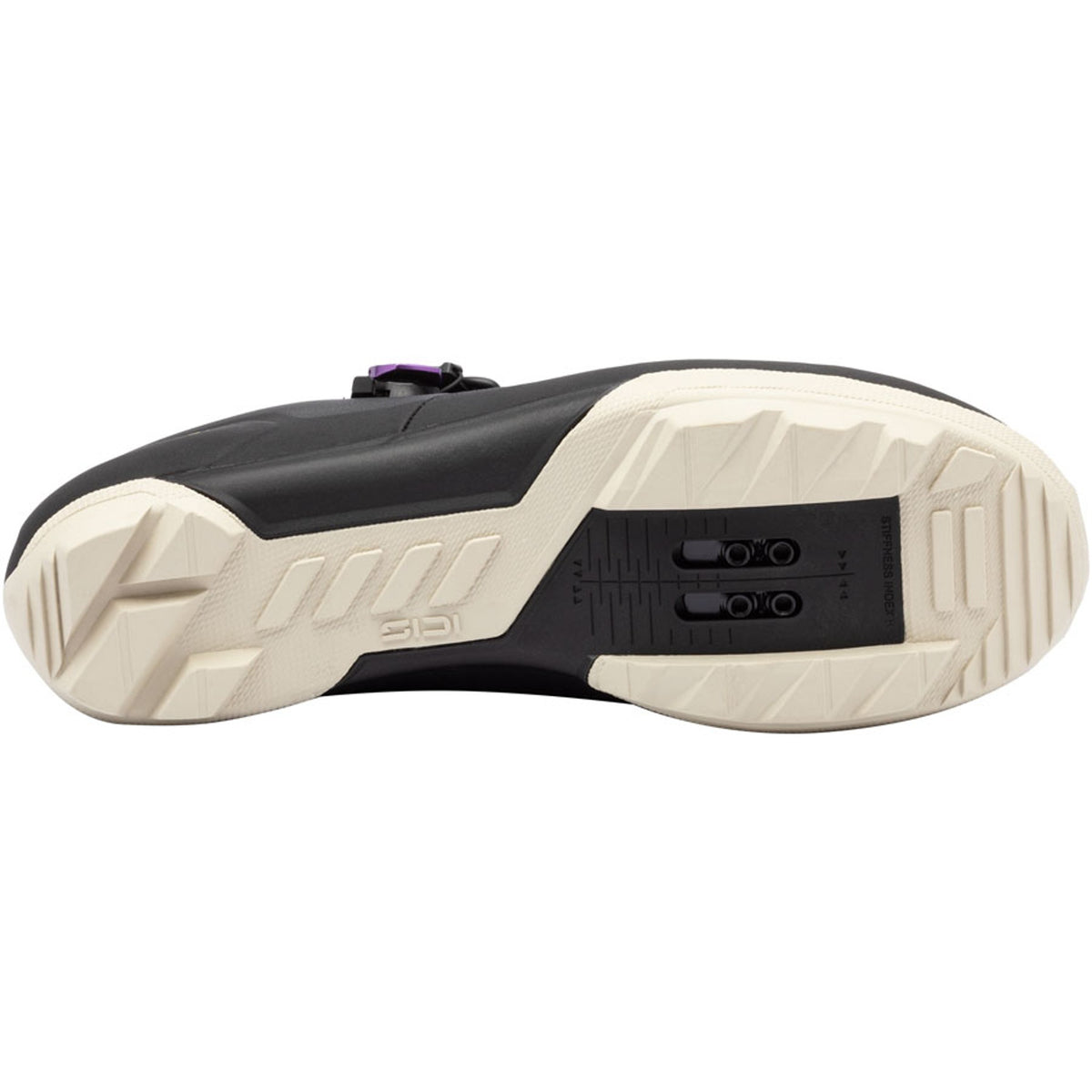 Black gravel cycling shoe outsole with cream sidewall and tread pattern detail