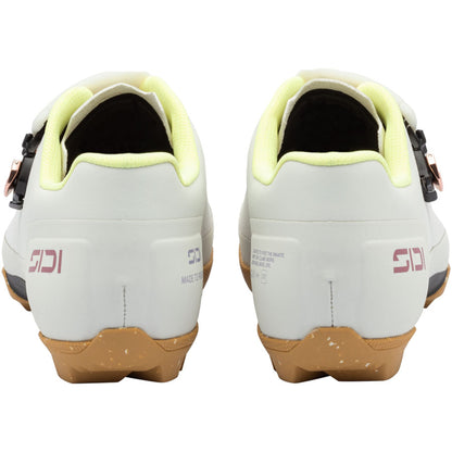 Ice white cycling shoe heel view with lime lining, back logo, and two closure straps