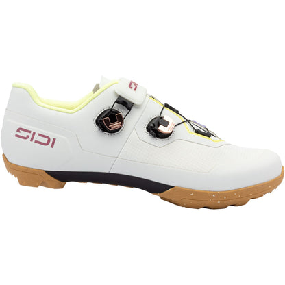 Men's gravel cycling shoe in ice white with two Velcro straps and lime heel lining