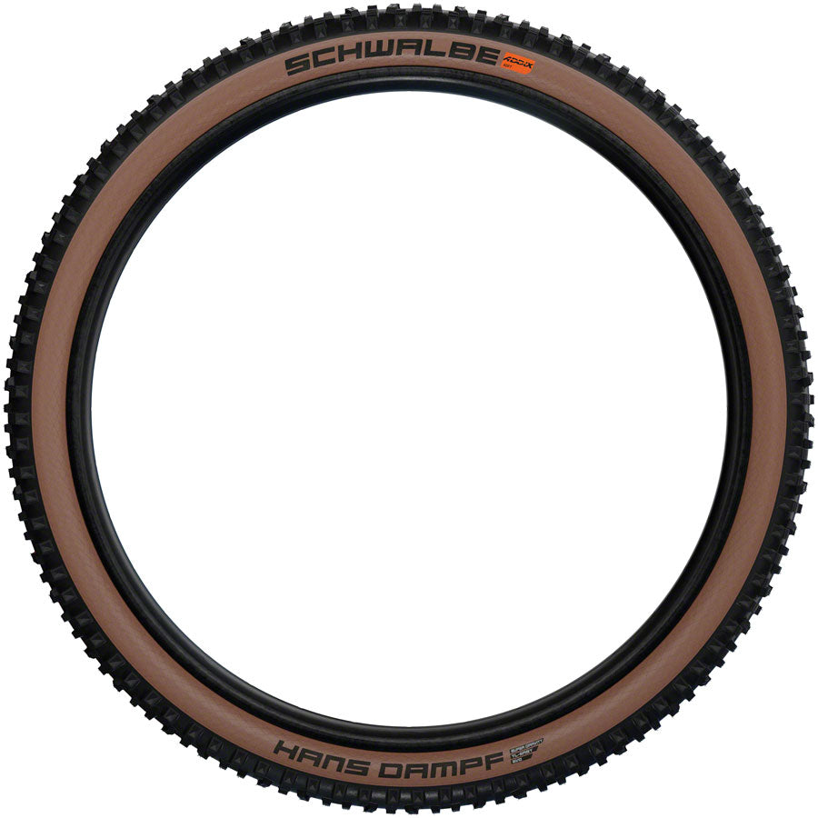 Hans Dampf Tire - 27.5 x 2.6 Tubeless Folding BLK/Bronze Evolution Line Super Trail Addix Soft - Bicycle Warehouse