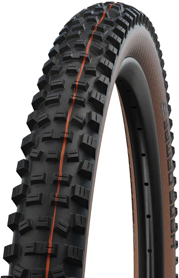 Hans Dampf Tire - 27.5 x 2.6 Tubeless Folding BLK/Bronze Evolution Line Super Trail Addix Soft - Bicycle Warehouse