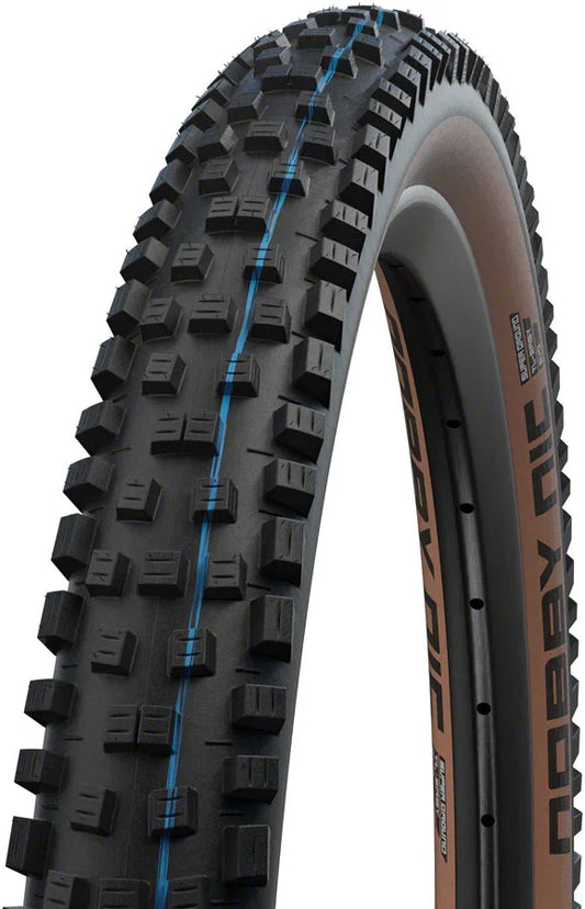 Nobby Nic Tire - 29 x 2.4 Tubeless Folding BLK/Bronze Evolution Line Super Ground Addix SpeedGrip - Bicycle Warehouse
