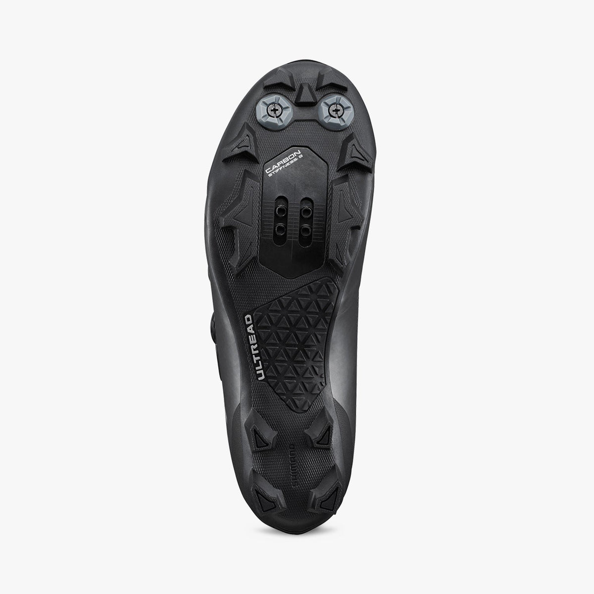 Black cycling shoe outsole with traction studs and vented plate