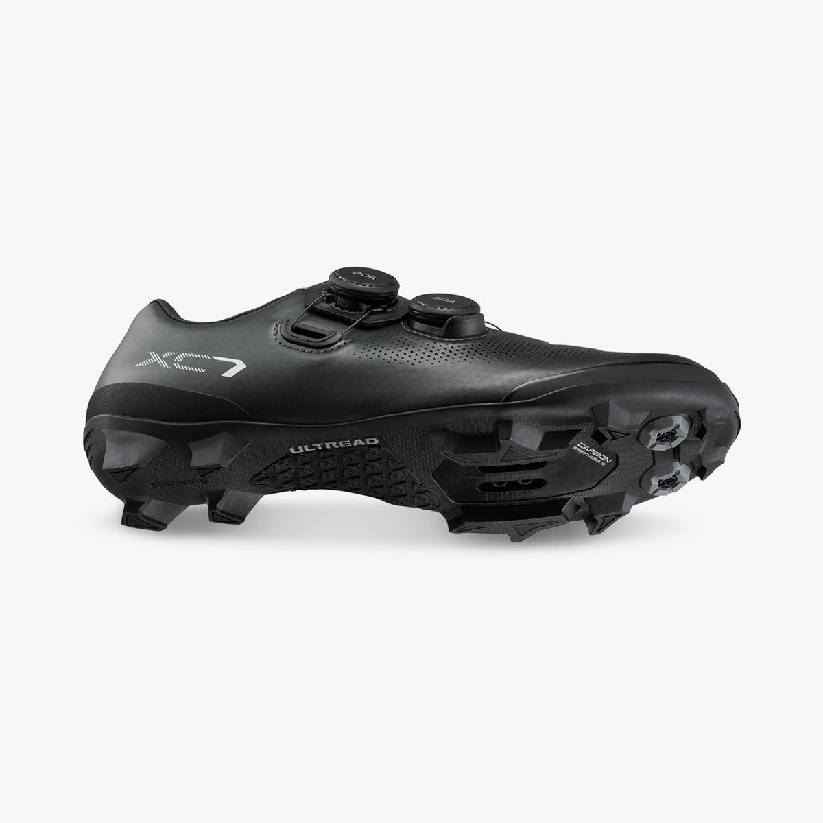 Black cycling shoe, heel and side view with BOA dials and cleat-ready sole