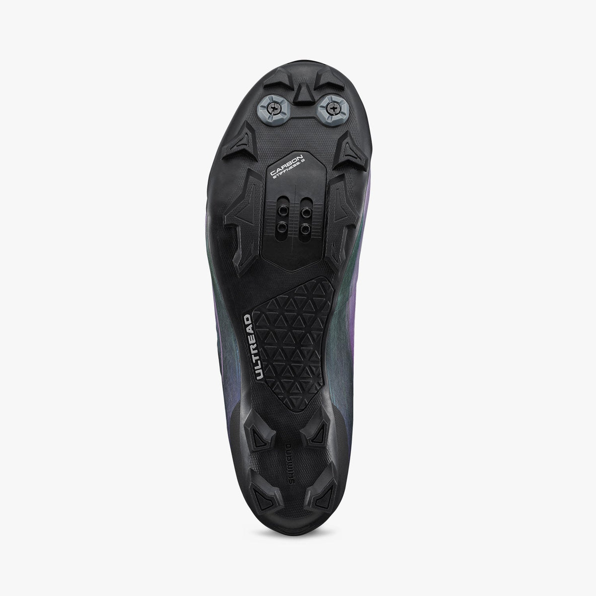 Iridescent purple cycling shoe outsole with molded traction studs and cleat mounting