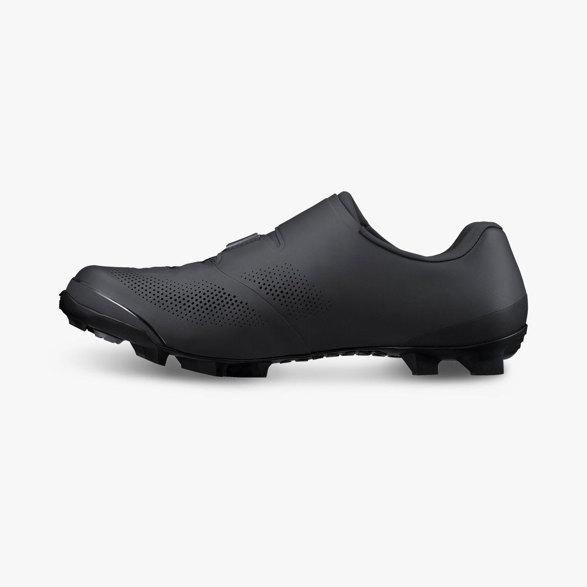 Black cycling cleat shoe, side view with studded outsole and smooth upper panel