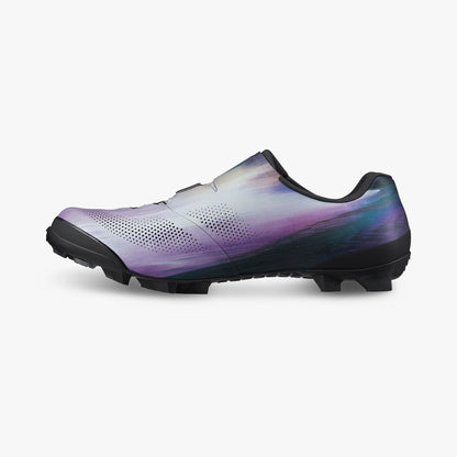 Iridescent purple cycling cleat shoe side view with studded outsole