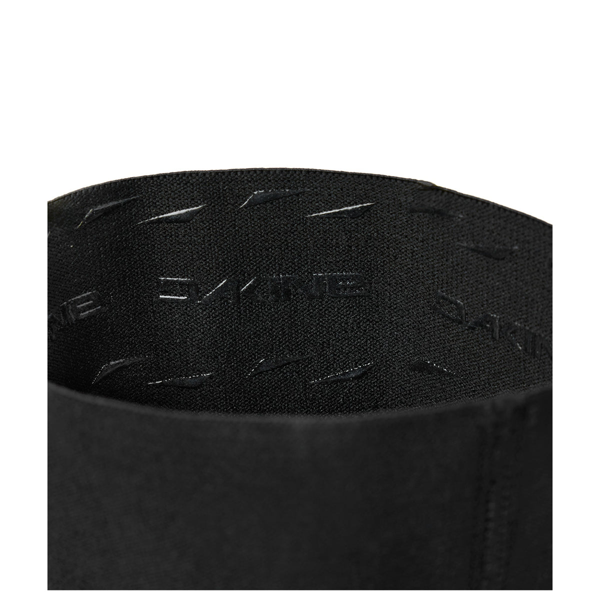 Black elbow sleeve fabric close-up with embossed/printed text and stitching