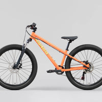 Storm 24 orange mountain bike with front suspension fork and disc brakes
