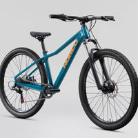 Teal 26 in mountain bike side view with black suspension fork and disc brake rotor
