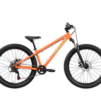 Storm 24 orange mountain bike side view with knobby tires and rear disc brake