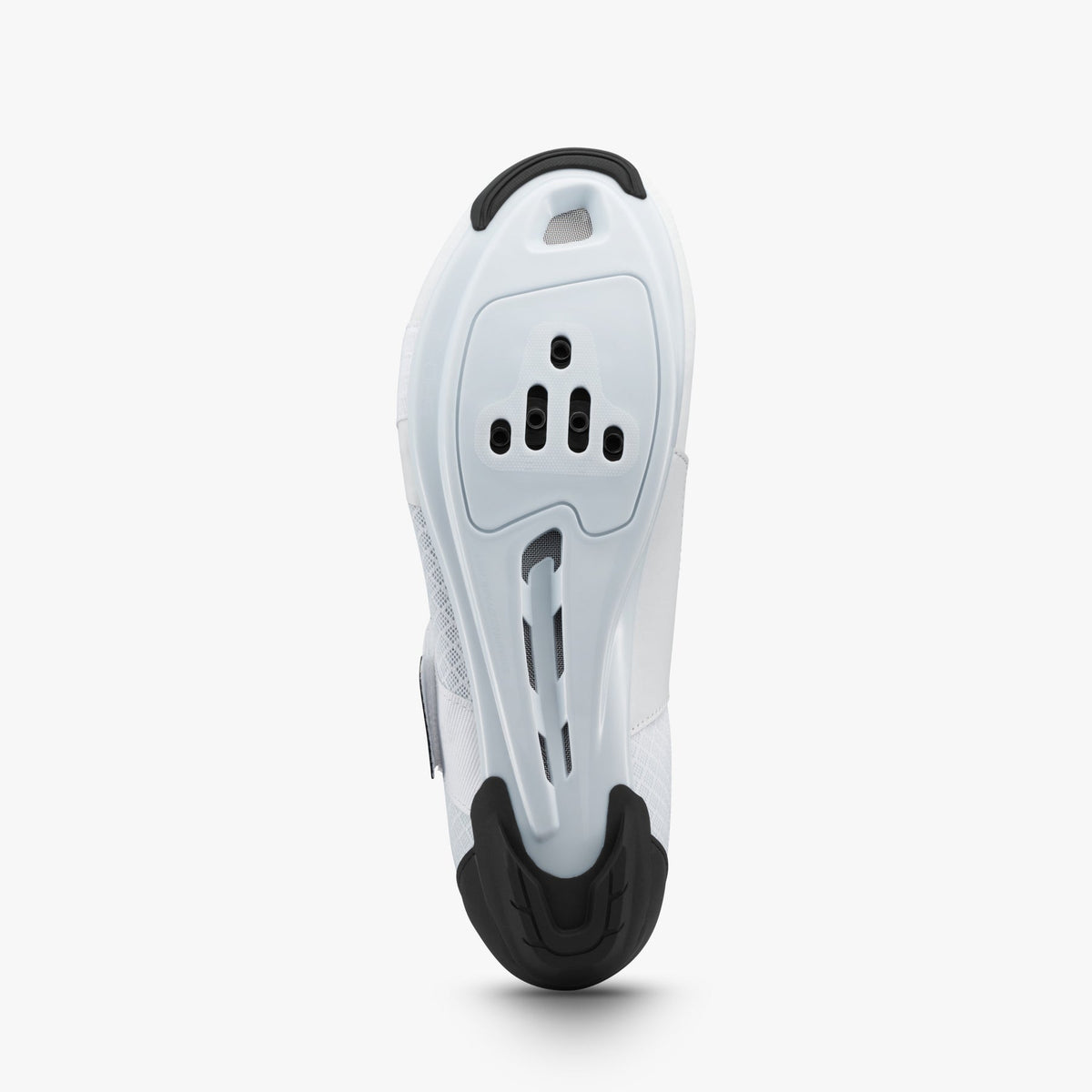 Underside of a white Shimano women's cycling shoe with cleat mounts and black heel tread