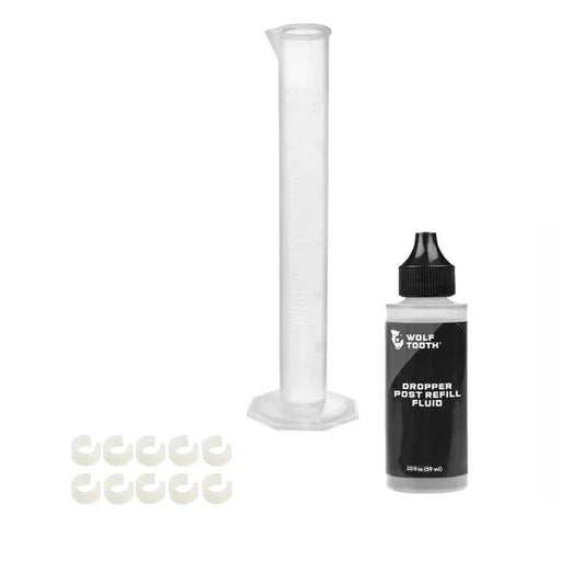 Resolve Dropper Post Service Kit - Refill Fluid 2oz Graduated Cylinder 10 Travel Adjustment Spacers - Bicycle Warehouse