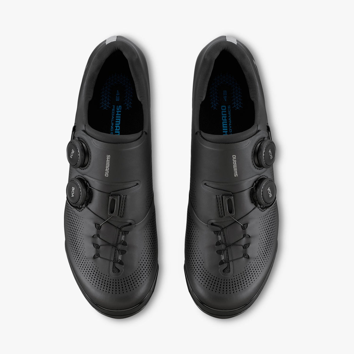Pair of black cycling cleat shoes with perforated toe and lace-up front