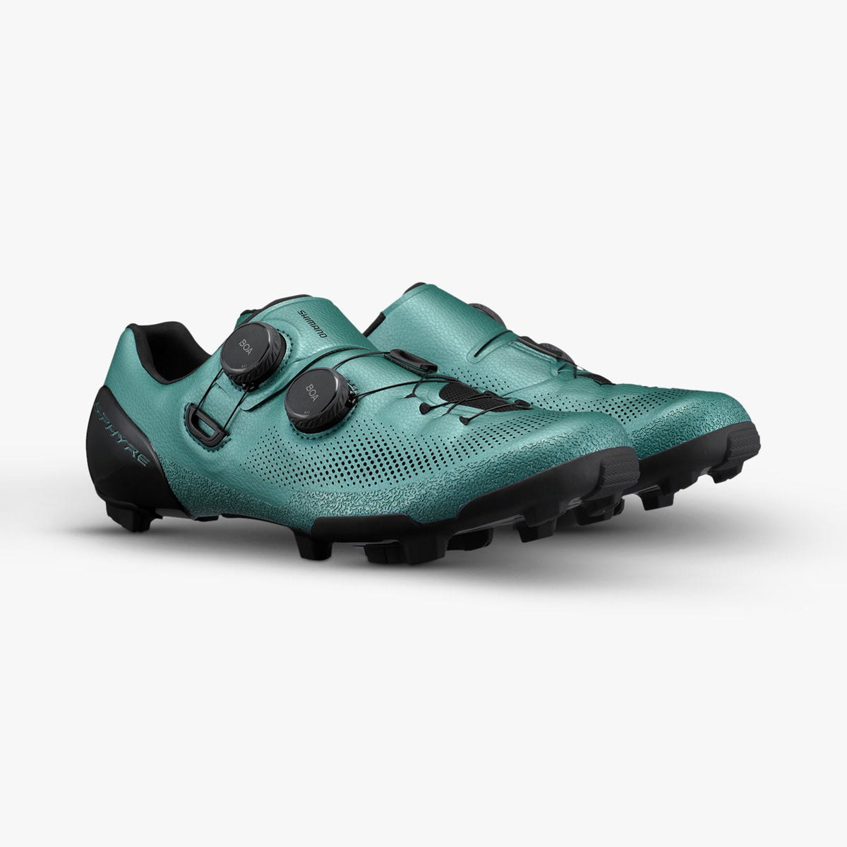 S-PHYRE SH-RX910 cycling shoes in teal with dual dial closures and lugged black soles